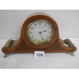 An Edwardian inlaid mantel clock in working order.