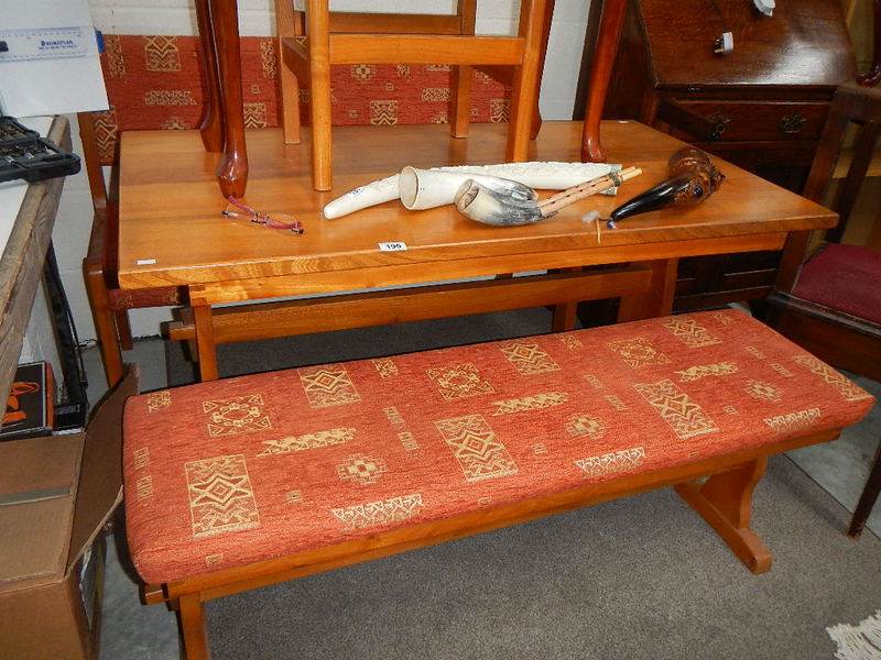 A cottage table and 2 benches.