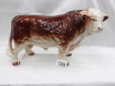 A pottery Hereford bull.