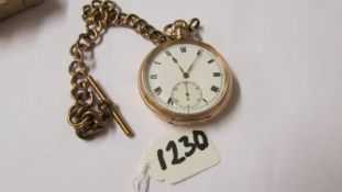 A gold plated pocket watch with a genuine 1932 Rolex movement.