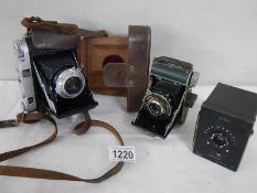 3 vintage camera's being Baby Hawkey, Vario and Balda.