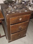 A Victorian pine 3 drawer chest.