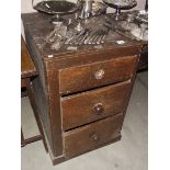 A Victorian pine 3 drawer chest.