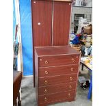 A 5 drawer chest and a matching wardrobe.