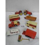 A mixed lot of Dinky and Corgi including Landrover, bust, milk float, tractors etc.