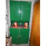 An old 4 door metal cabinet.