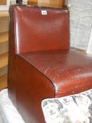 A small leather chair.