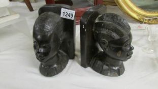 A pair of ethnic head bookends.