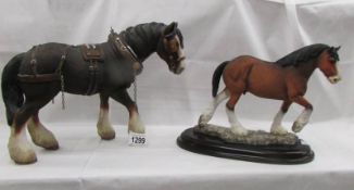 A Country Legacy Clydesdale and an unmarked shire horse.