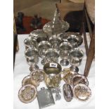 A selection of plated metalware including cake stand,