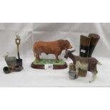 A Limousin bull, A Leonardo Goat, Leonardo doves and model boots.