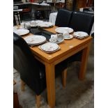 A good kitchen table and 4 leather seat chairs.