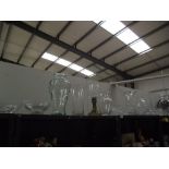 A quantity of large glass vases etc.