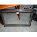A wall mounting glass frame.