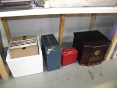 A record player and 2 boxes of records