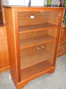 A mahogany 2 door glazed cabinet.