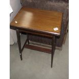 A small Edwardian inlaid mahogany fold over card/tea table.