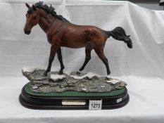 A Royal Doulton limited edition horse "Flight of the Trakehner" No.590.