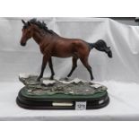 A Royal Doulton limited edition horse "Flight of the Trakehner" No.590.