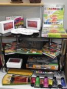 4 shelves of artists materials