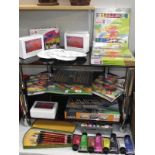 4 shelves of artists materials