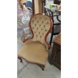 A mahogany framed ladies chair.