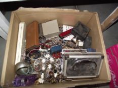 A large box of mixed costume jewellery.