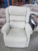 An electric reclining arm chair