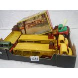 A boxed tinplate Welso toys T732 bulldozer and 4 Bedford lorries including 2 transporters.