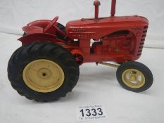 A rare large scale Lesney 745D Massey Harris tractor.