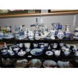 2 shelves of Delft hand painted pottery, some a/f.