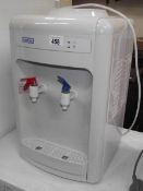 A Just Eau hot and cold office water dispenser.