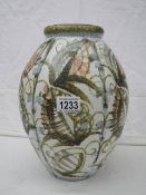 A large Denby vase.