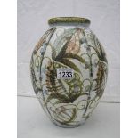 A large Denby vase.