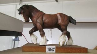 A Beswick brown shire horse.