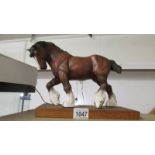 A Beswick brown shire horse.