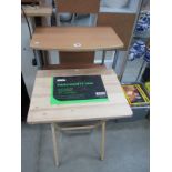 A 3 tier shelf unit and a folding table
