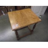 A polished oak side/coffee table, (collect only).