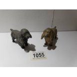 A pair of 1920/30's hollow cast spelter cocker spaniels.