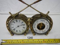 A good early 20th century brass horse shoe clock/barometer, barometer missing glass.