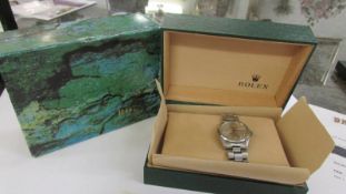 A Gent's Rolex Oyster Perpetual automatic wristwatch in steel on a steel oyster bracelet in