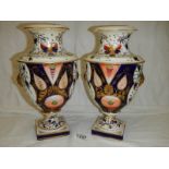 A good pair of Victorian vases, had some restoration and handles missing.