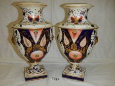 A good pair of Victorian vases, had some restoration and handles missing.