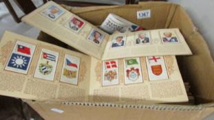 A large quantity of cigarette and trade cards in albums including 1938 cricketers.