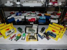 A mixed lot of boxed and unboxed die cast including Lledo, Corgi, Solido etc.