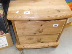 A solid pine 2 drawer bedside chest (collect only).