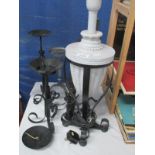 A quantity of wrought iron cndle stands etc