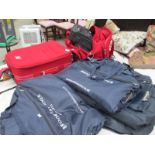 A quantity of suit bags,