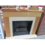 Two electric fires with surrounds