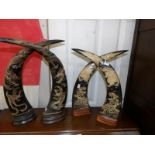4 ornamental cow horns.